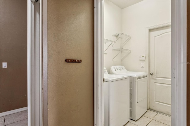 20606 Whitewood Way, Tampa, FL 33647 - laundry area featuring light tile patterned floors and washing machine and clothes dryer