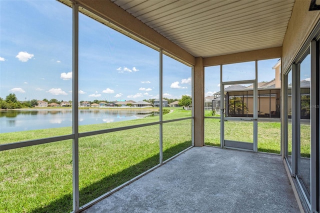 20606 Whitewood Way, Tampa, FL 33647 - unfurnished sunroom featuring a water view and a residential view