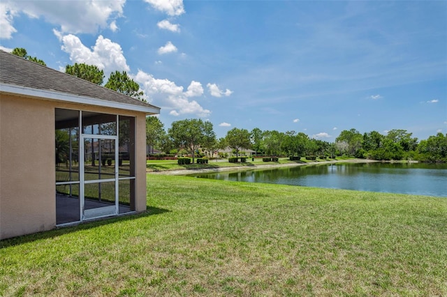 20606 Whitewood Way, Tampa, FL 33647 - view of green lawn with a water view and a sunroom