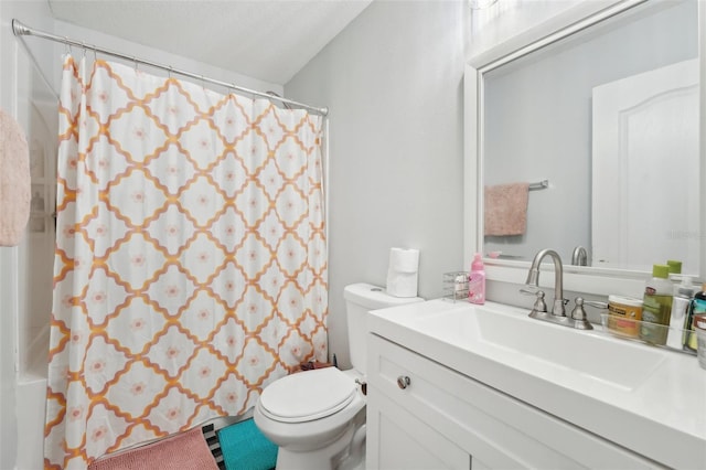 bathroom featuring vanity, a shower with curtain, and toilet