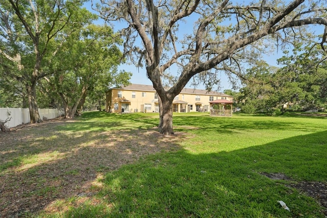 view of yard featuring fence