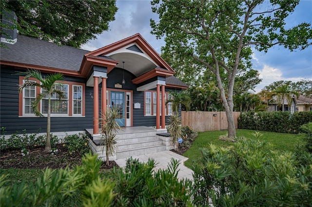 2536 Burlington Ave N, Saint Petersburg, FL 33713 - bungalow-style home featuring fence and roof with shingles