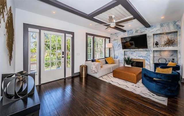 2536 Burlington Ave N, Saint Petersburg, FL 33713 - living room featuring hardwood / wood-style floors, beamed ceiling, ceiling fan, recessed lighting, and a large fireplace