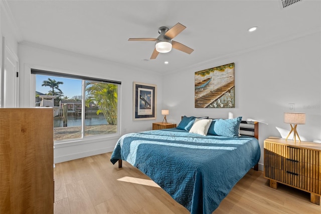 17730 Long Point Dr, Redington Shores, FL 33708 - bedroom with ornamental molding, wood finished floors, and recessed lighting