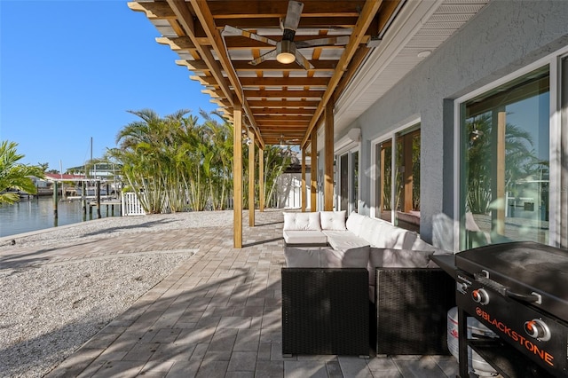 17730 Long Point Dr, Redington Shores, FL 33708 - view of patio featuring grilling area, outdoor lounge area, a water view, and ceiling fan