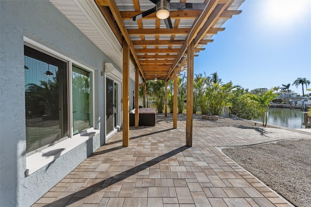 17730 Long Point Dr, Redington Shores, FL 33708 - view of patio / terrace with a water view and a ceiling fan