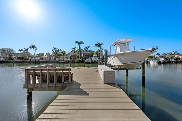 17730 Long Point Dr, Redington Shores, FL 33708 - dock area featuring a residential view, a water view, and boat lift