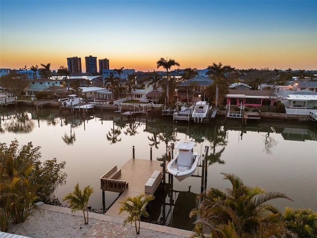 17730 Long Point Dr, Redington Shores, FL 33708 - view of dock featuring a residential view, a water view, and boat lift