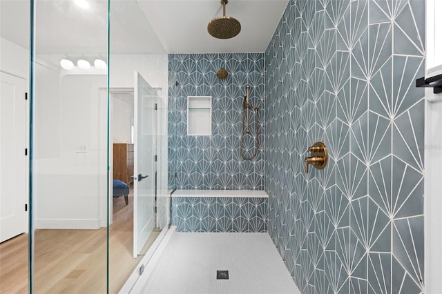 17730 Long Point Dr, Redington Shores, FL 33708 - full bathroom featuring wood finished floors and tiled shower