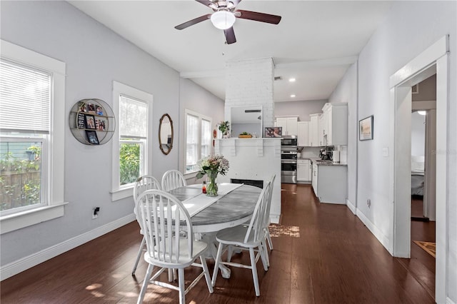 dining space featuring a ceiling fan, visible vents, baseboards, and dark wood-type flooring