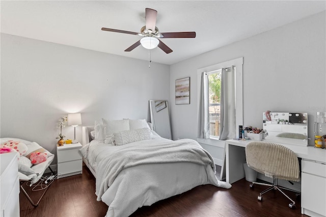 bedroom featuring a ceiling fan and wood finished floors