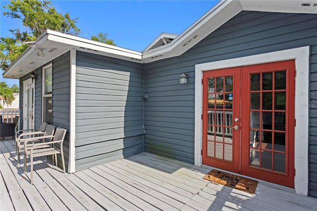 wooden terrace with french doors