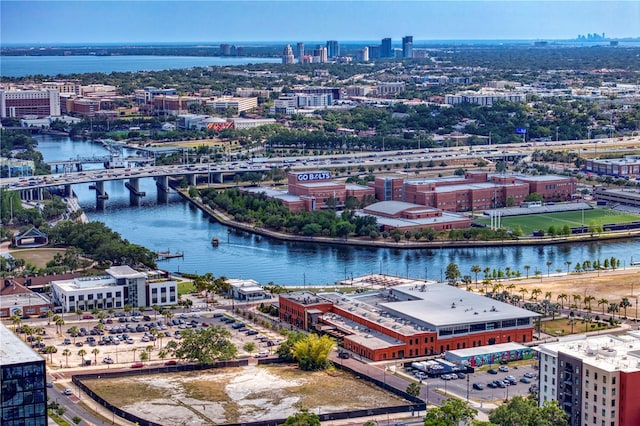 bird's eye view featuring a view of city and a water view