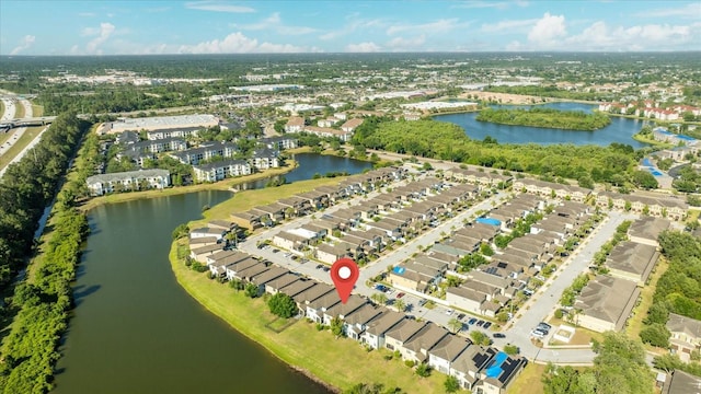 1227 Ballard Green Pl, Brandon, FL 33511 - drone / aerial view with a residential view and a water view