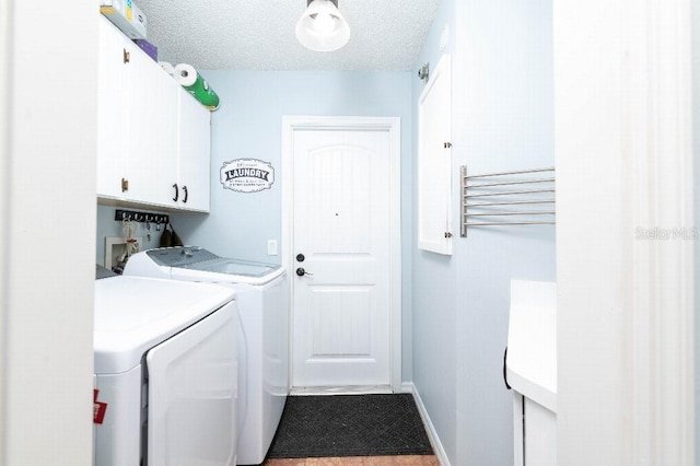 2435 Comerwood Dr, Spring Hill, FL 34609 - laundry area with washer and dryer, baseboards, and cabinet space