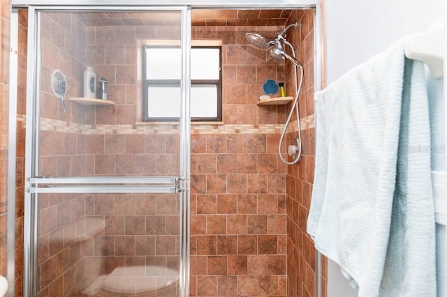 2435 Comerwood Dr, Spring Hill, FL 34609 - bathroom featuring a shower stall