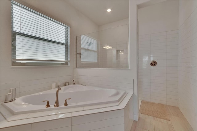 17583 Holly Well Ave, Wimauma, FL 33598 - full bathroom with a bath, tile patterned flooring, a walk in shower, and recessed lighting