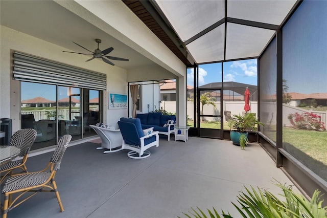 17583 Holly Well Ave, Wimauma, FL 33598 - sunroom with outdoor lounge area, a ceiling fan, and a wealth of natural light