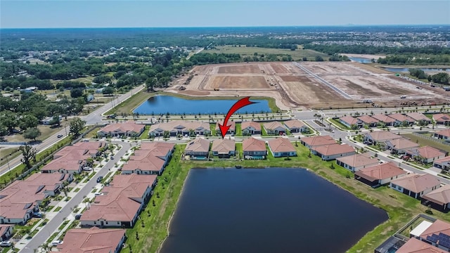17583 Holly Well Ave, Wimauma, FL 33598 - birds eye view of property featuring a residential view and a water view