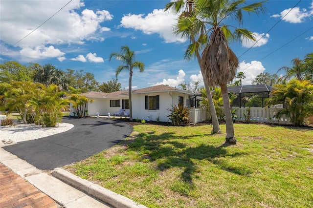 225 Cevera Dr, Dunedin, FL 34698 - single story home with a front yard and stucco siding
