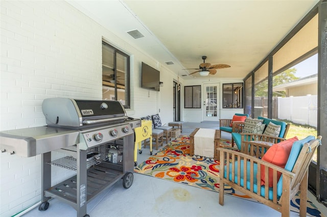 225 Cevera Dr, Dunedin, FL 34698 - view of patio / terrace with visible vents, fence, ceiling fan, grilling area, and an outdoor living space