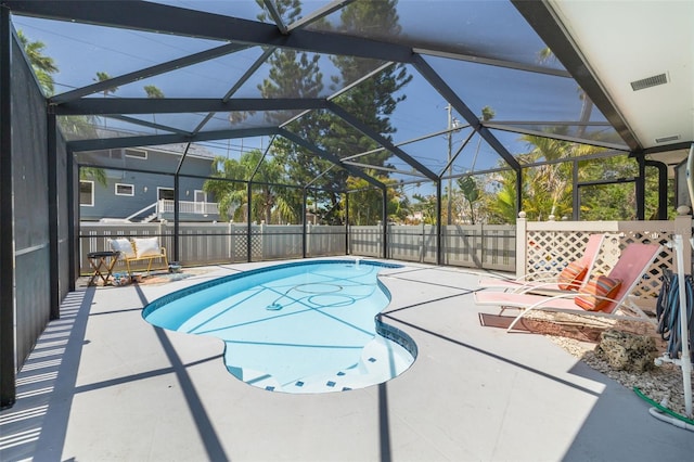 225 Cevera Dr, Dunedin, FL 34698 - view of swimming pool with a lanai, fence, a patio, and a fenced in pool