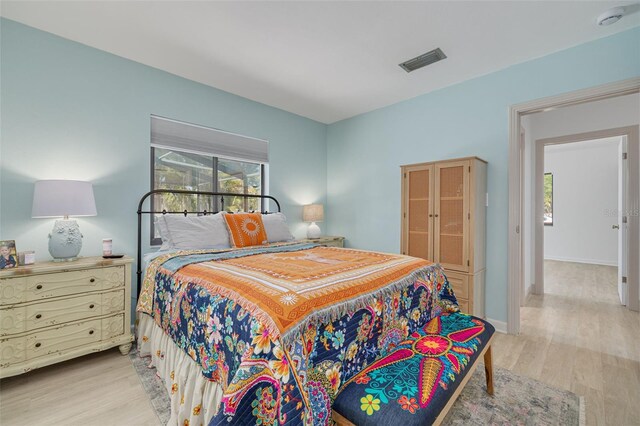 225 Cevera Dr, Dunedin, FL 34698 - bedroom with visible vents and wood finished floors