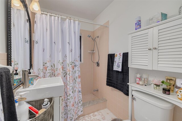 225 Cevera Dr, Dunedin, FL 34698 - full bathroom with toilet and a tile shower