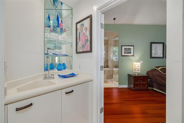 2613 59th St S, Gulfport, FL 33707 - full bath with vanity, wood finished floors, and a shower