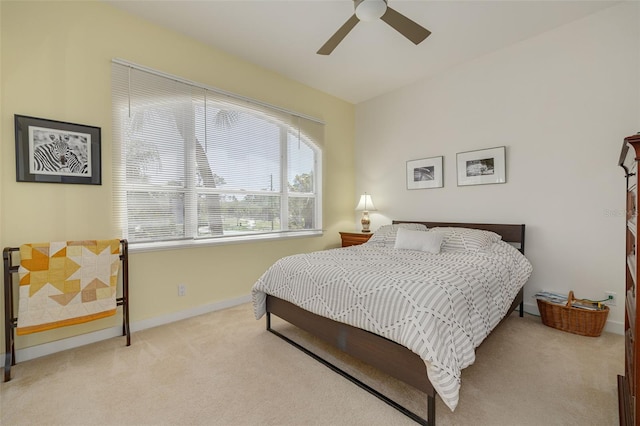 2613 59th St S, Gulfport, FL 33707 - carpeted bedroom featuring baseboards and ceiling fan