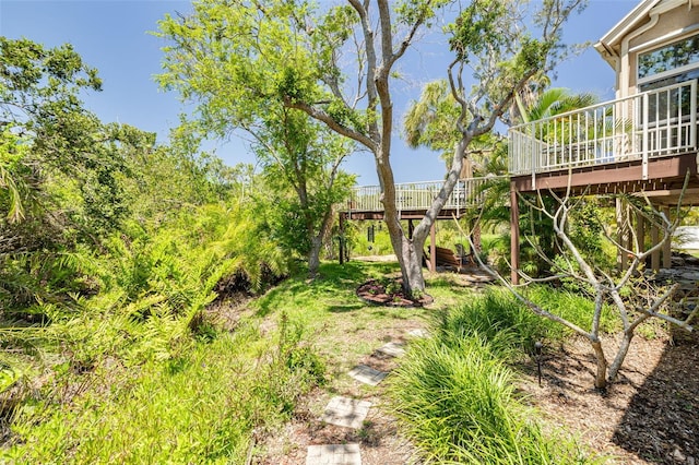 2613 59th St S, Gulfport, FL 33707 - view of yard with a wooden deck