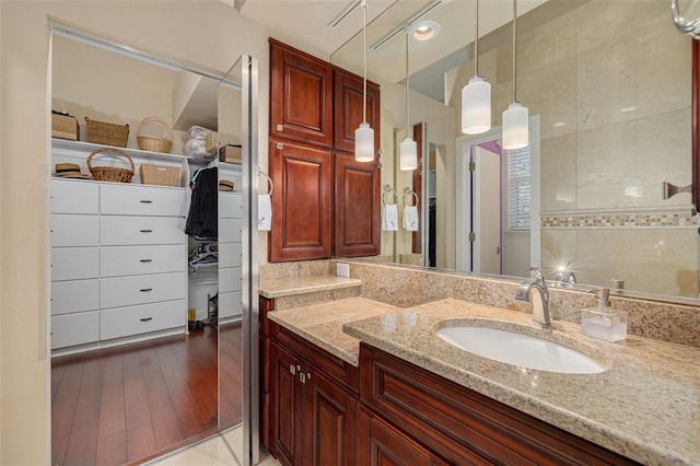 2613 59th St S, Gulfport, FL 33707 - bathroom featuring vanity and wood finished floors