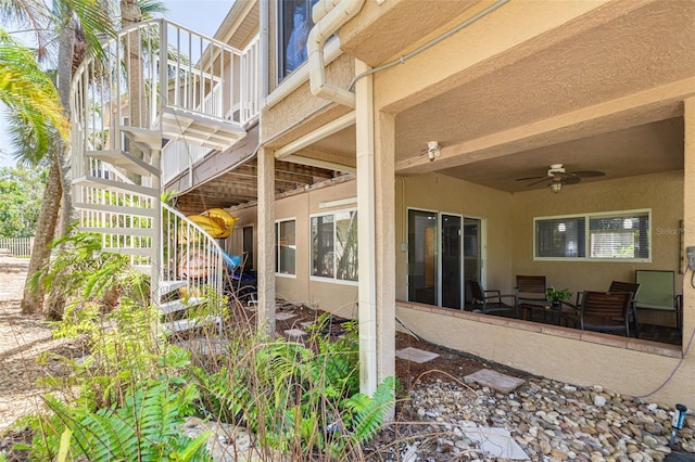 2613 59th St S, Gulfport, FL 33707 - view of patio / terrace with stairway and a ceiling fan