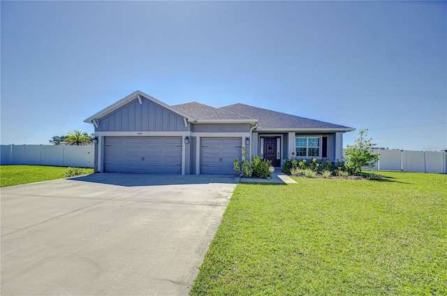 4444 Devinshire Fields Loop, Plant City, FL 33567 - ranch-style house with an attached garage, driveway, and board and batten siding