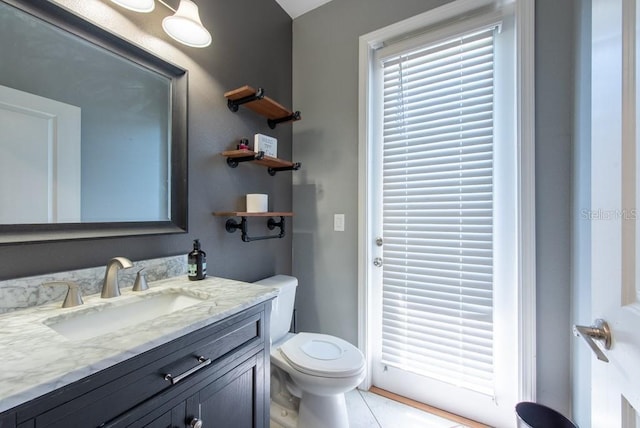 13639 Ashlar Slate Pl, Riverview, FL 33579 - bathroom featuring toilet, vanity, and tile patterned flooring