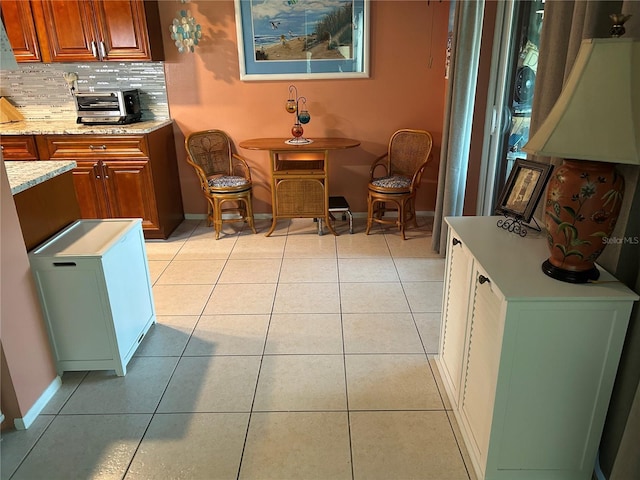6190 80th St N Unit 204, Saint Petersburg, FL 33709 - dining space featuring baseboards and light tile patterned floors