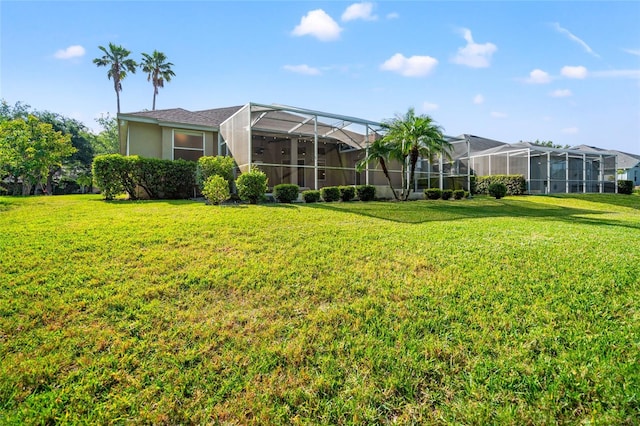 view of yard with a lanai