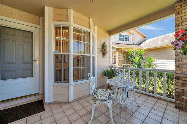 balcony featuring covered porch