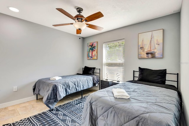 3044 Golden Rain Dr, Sarasota, FL 34232 - bedroom with baseboards, a ceiling fan, and recessed lighting
