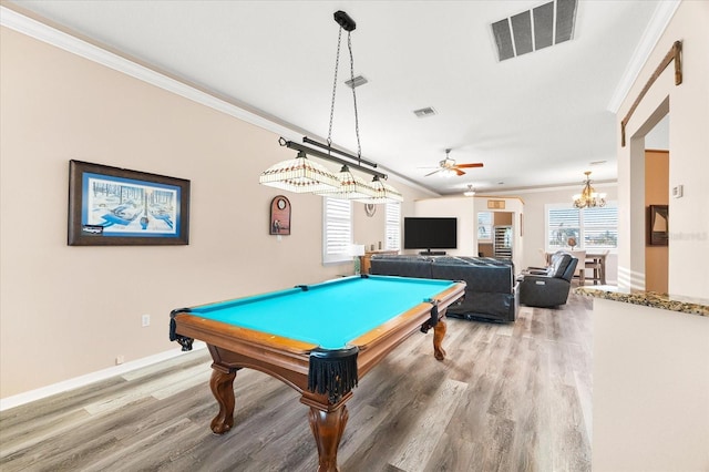 recreation room with light wood finished floors, ceiling fan with notable chandelier, visible vents, ornamental molding, and pool table