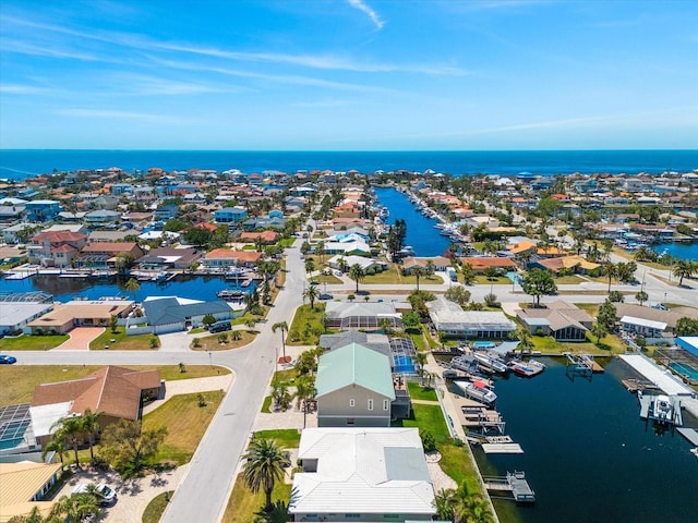aerial view with a water view and a residential view