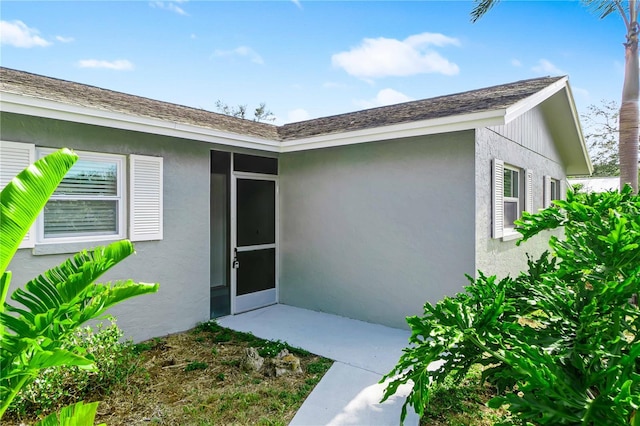 5519 Homewood Dr, Sarasota, FL 34232 - doorway to property featuring stucco siding