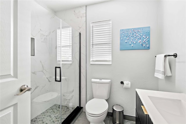 5519 Homewood Dr, Sarasota, FL 34232 - full bathroom featuring vanity, a marble finish shower, and toilet