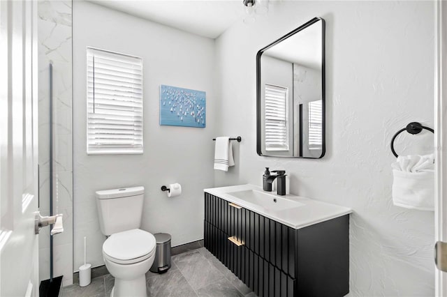 5519 Homewood Dr, Sarasota, FL 34232 - bathroom with plenty of natural light, vanity, and toilet