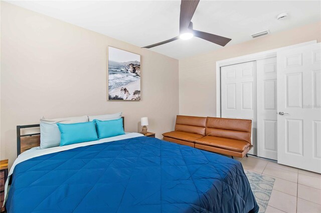5519 Homewood Dr, Sarasota, FL 34232 - bedroom with visible vents, ceiling fan, a closet, and light tile patterned flooring