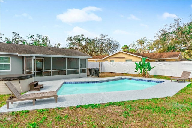5519 Homewood Dr, Sarasota, FL 34232 - pool featuring a sunroom, a jacuzzi, a fenced backyard, and a patio area