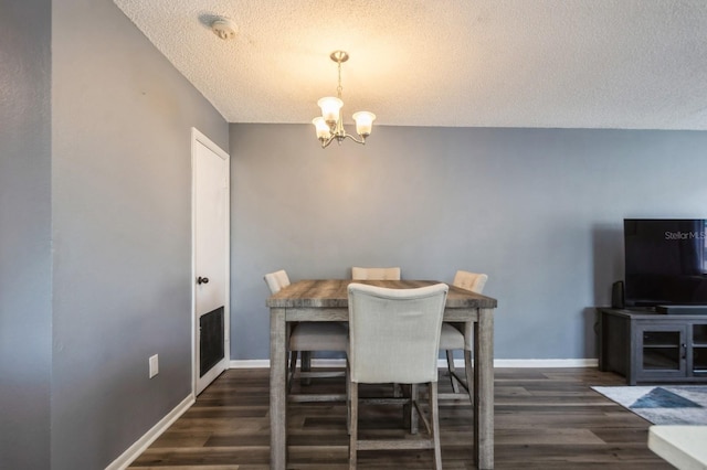 1821 Bough Ave Unit 4, Clearwater, FL 33760 - dining space with a textured ceiling, a chandelier, and wood finished floors