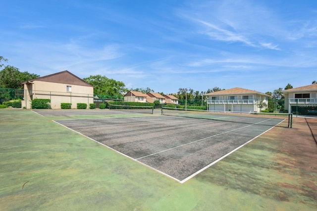 1821 Bough Ave Unit 4, Clearwater, FL 33760 - view of tennis court featuring community basketball court