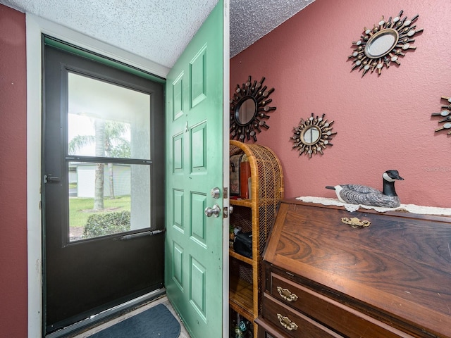 2555 Royal Pines Cir Unit A, Clearwater, FL 33763 - entryway with a textured ceiling and a textured wall