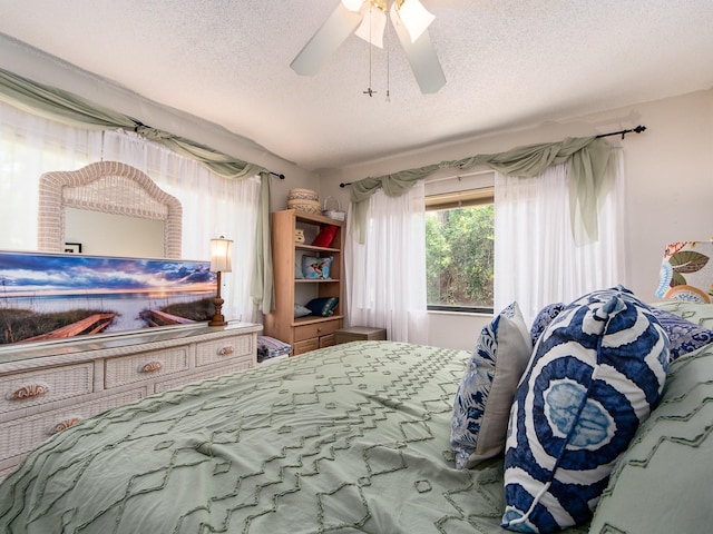 2555 Royal Pines Cir Unit A, Clearwater, FL 33763 - bedroom with a textured ceiling and ceiling fan